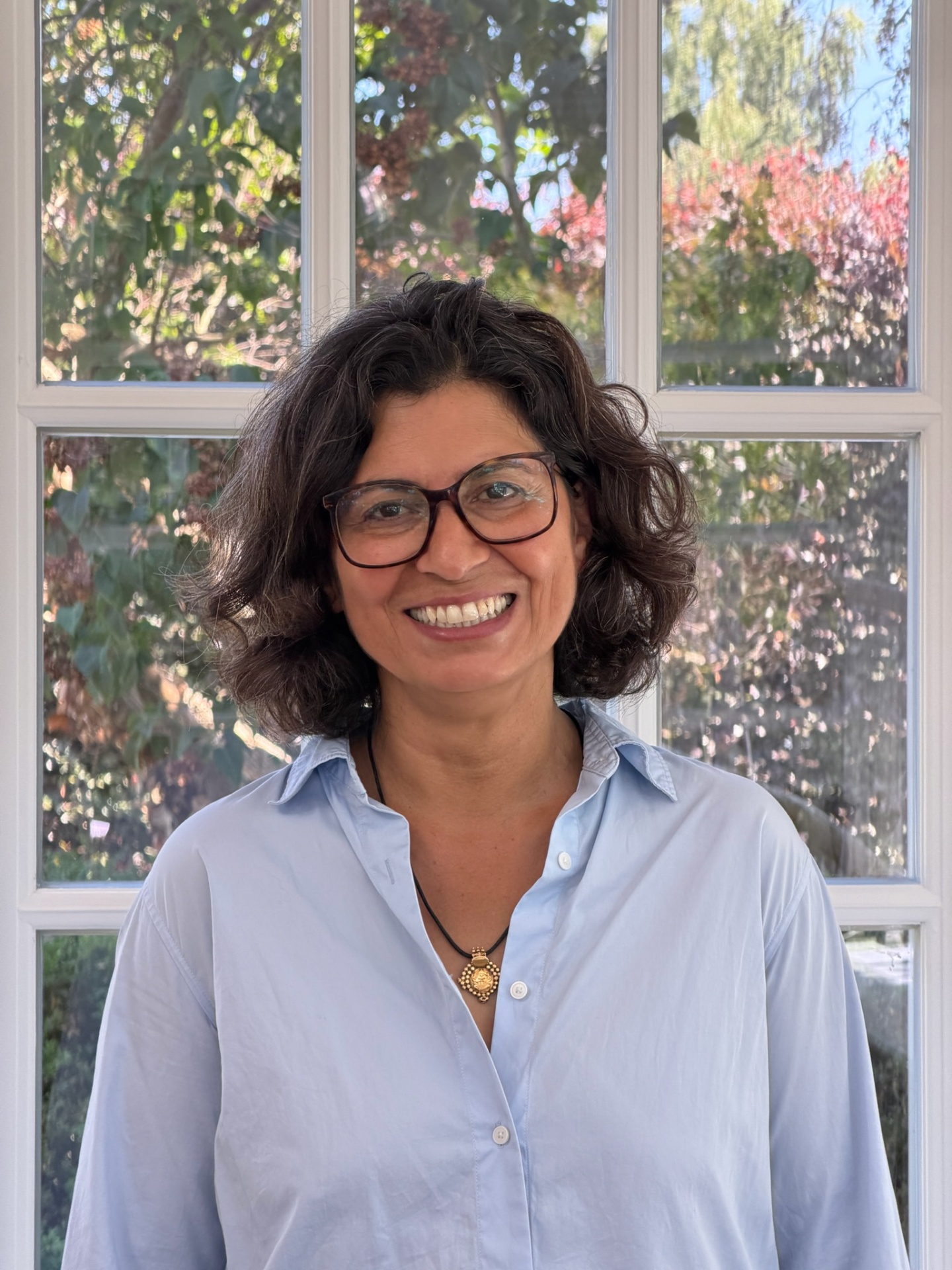 Dr. Mira Chandhok Skadegård